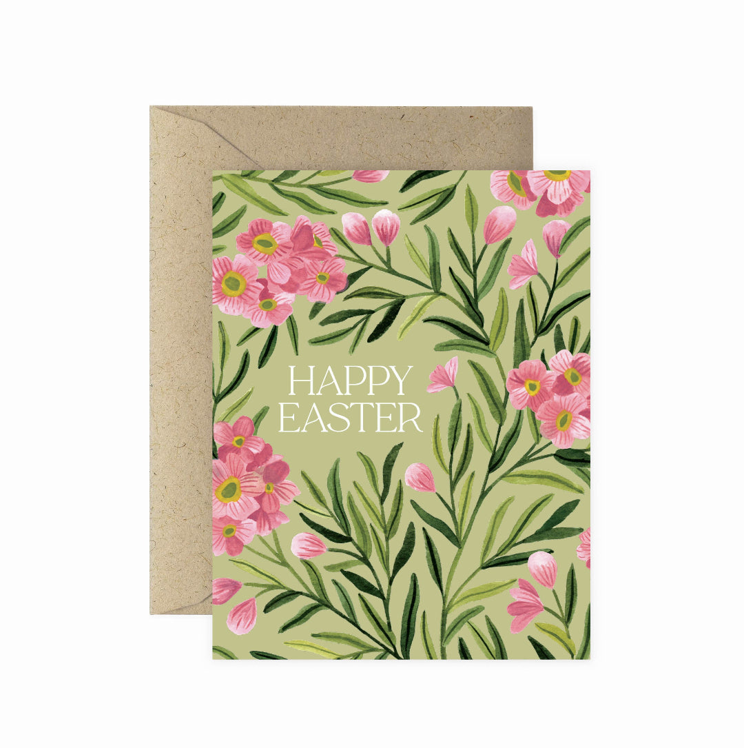 Greeting card with floral design and 'Happy Easter' text, featuring a kraft envelope.